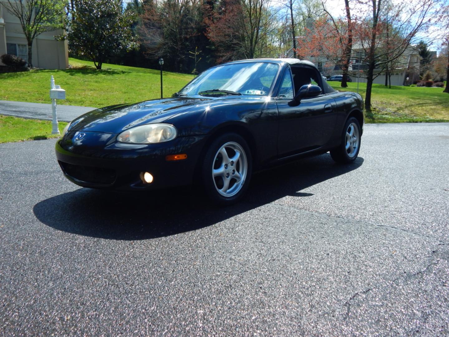 2002 Black /Black Cloth Mazda MX-5 Miata base (JM1NB353920) with an 1.8 liter 4 cylinder engine, 5 speed manual transmission, located at 6528 Lower York Road, New Hope, PA, 18938, (215) 862-9555, 40.358707, -74.977882 - Here for sale is a very fun 2002 Mazda MX-5 Miata. Under the hood is a strong running 1.8 liter 4 cylinder which puts power to the rear wheels via a solid shifting 5 speed manual transmission. Features include; Black cloth interior, wood grain trim, cold AC, power windows, AM/FM/CD, heated rear wi - Photo#0